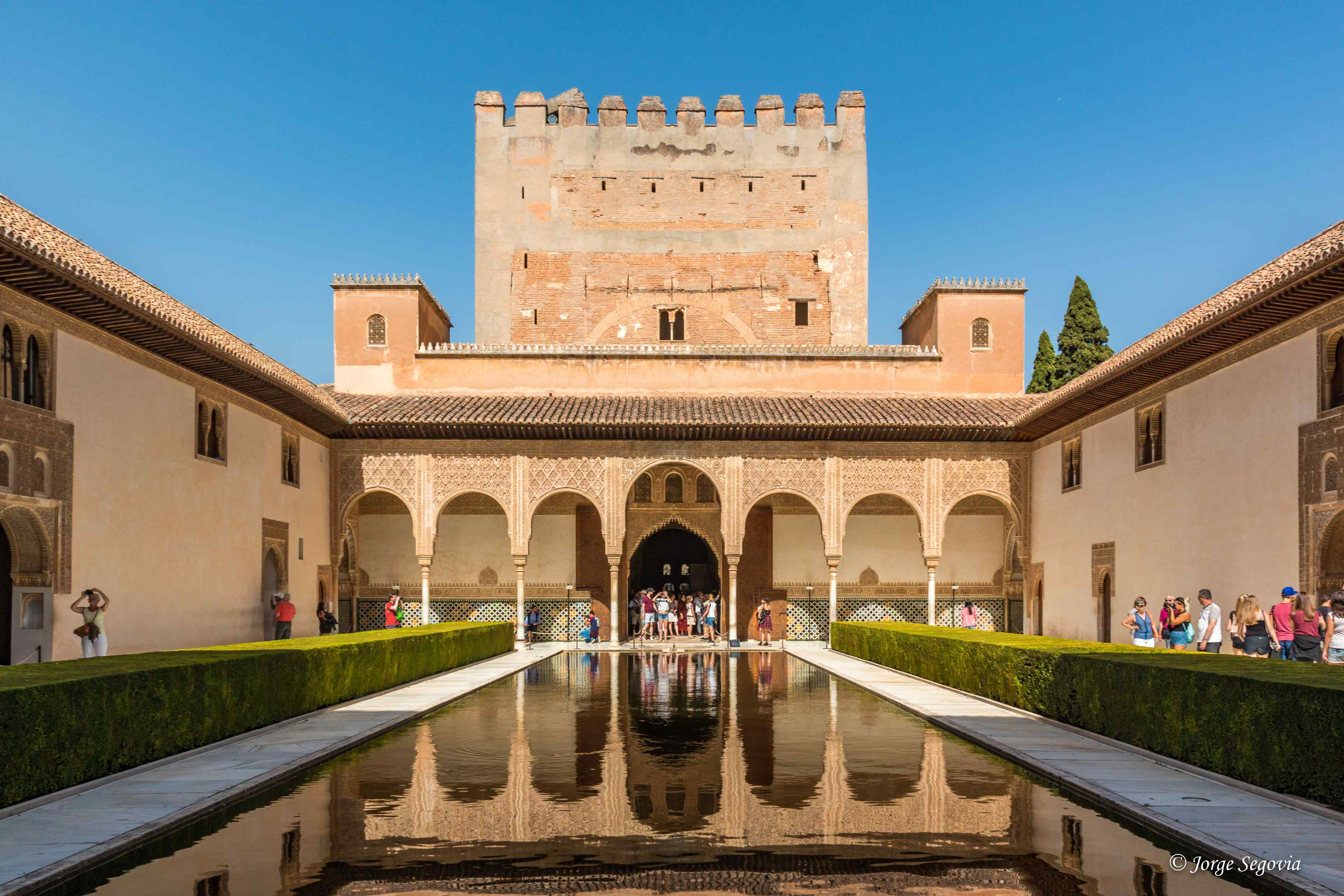 Patio de los Arrayanes — the still reflecting pool flanked by myrtle hedges in the Nasrid Palaces